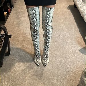 Steve Madden Thigh high synthetic snake skin print boots. New never worn.